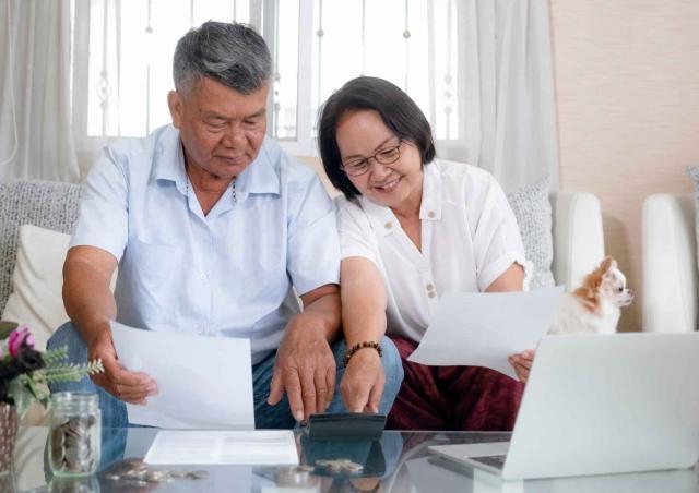 Couple reviewing financial institutions